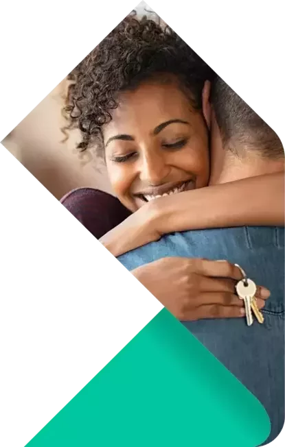 Woman with keys moving in to her home with Your home